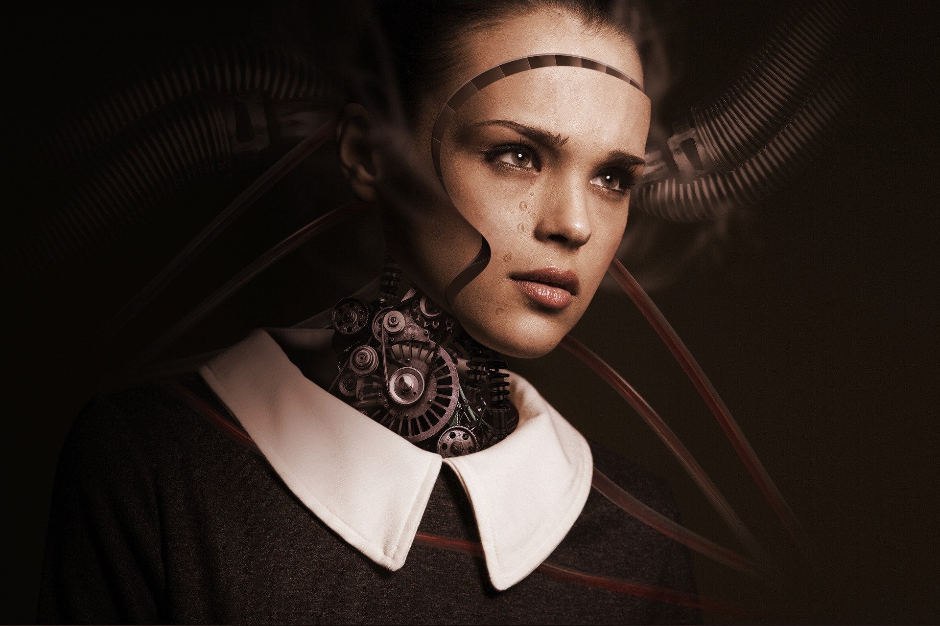 Robot bir kızın yüzü makineler tarafından çıkarılıyor.
